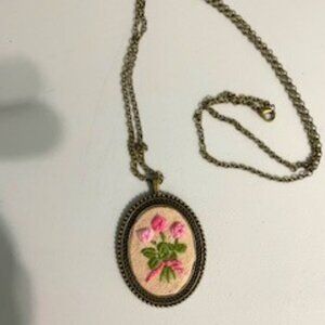 Hand embroidered necklace of roses